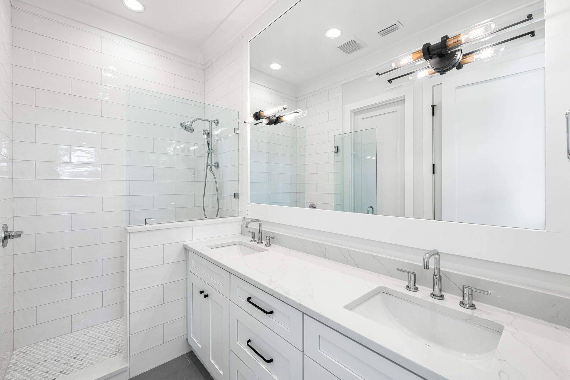 520 South County Highway 393, Unit 39B Santa Rosa Beach, FL 32459 - Photo 20 of 45 a bathroom with a double vanity sink mirror and shower