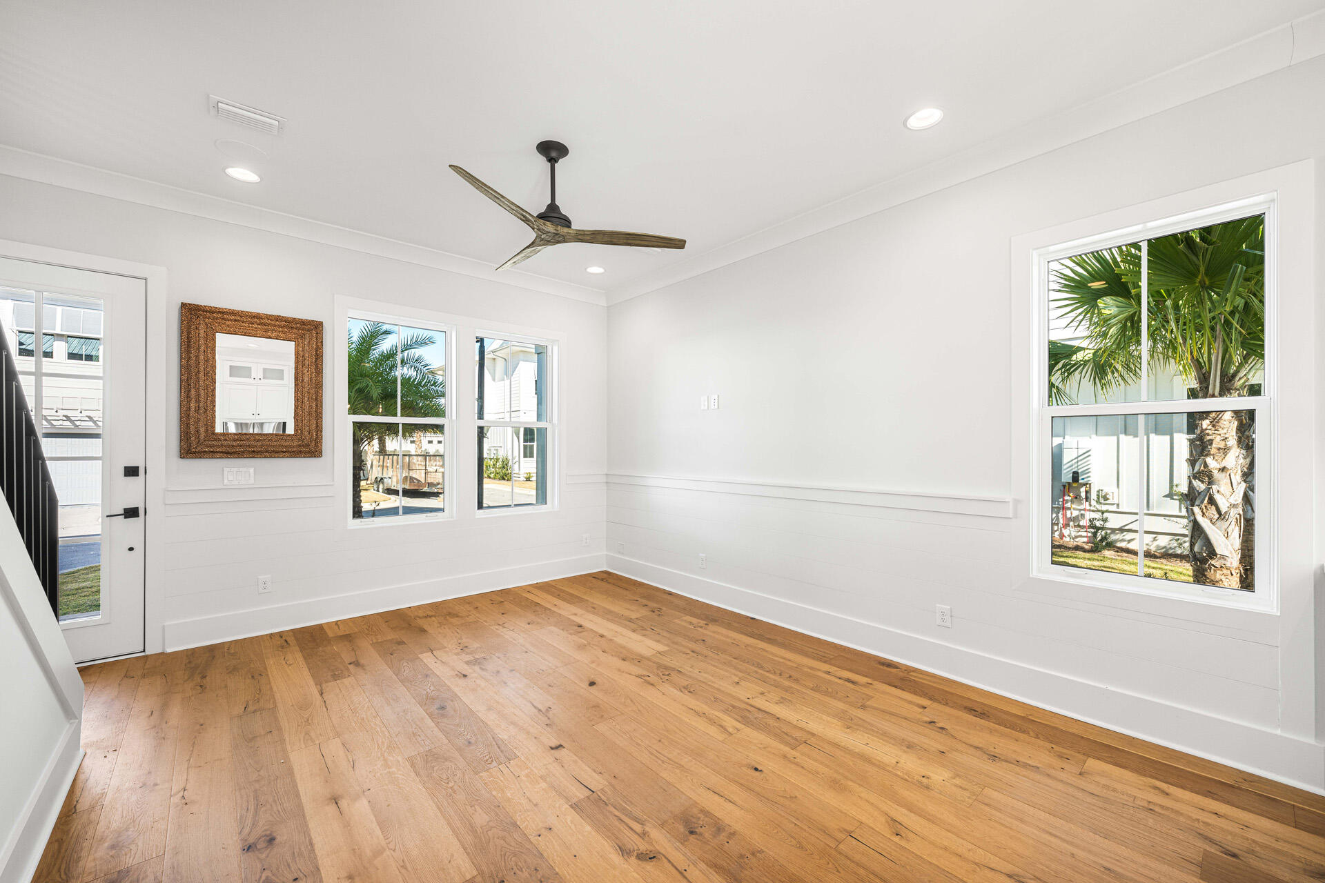 520 South County Highway 393, Unit 39B Santa Rosa Beach, FL 32459 - Photo 2 of 45 a view of an empty room with wooden floor and a window