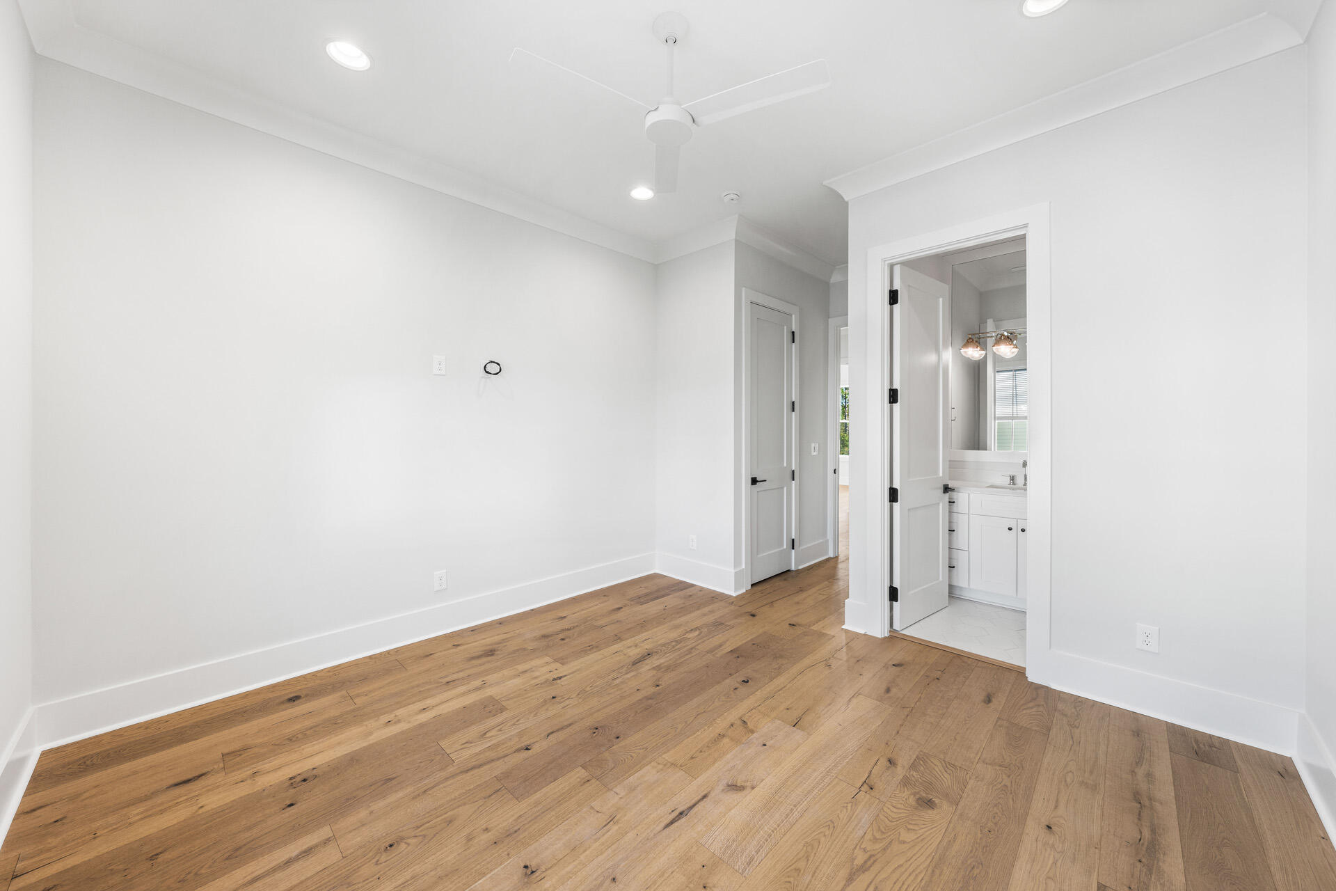 520 South County Highway 393, Unit 39B Santa Rosa Beach, FL 32459 - Photo 24 of 45 a view of hallway with wooden floor