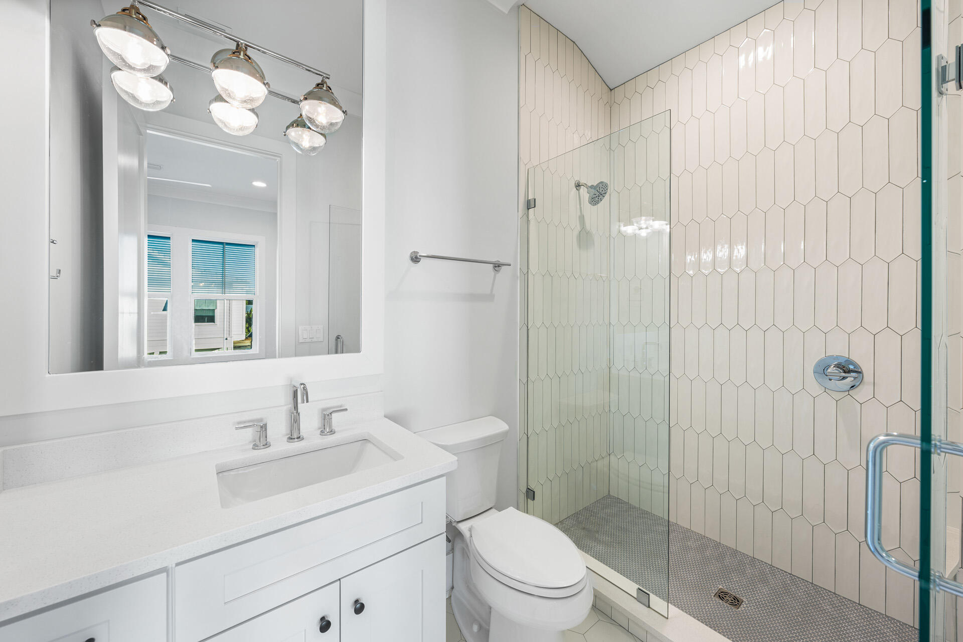 520 South County Highway 393, Unit 39B Santa Rosa Beach, FL 32459 - Photo 25 of 45 a bathroom with a sink a toilet and shower