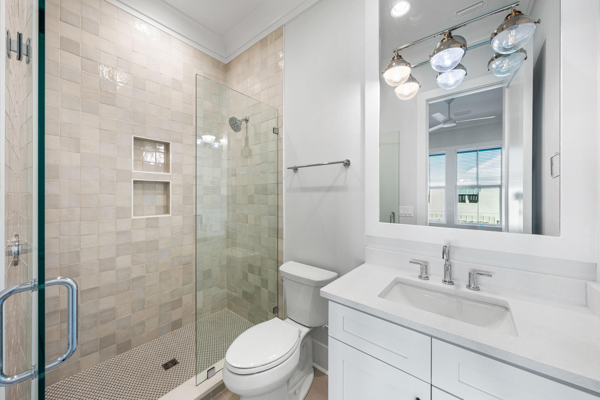 520 South County Highway 393, Unit 39B Santa Rosa Beach, FL 32459 - Photo 29 of 45 a bathroom with a sink vanity granite toilet and shower