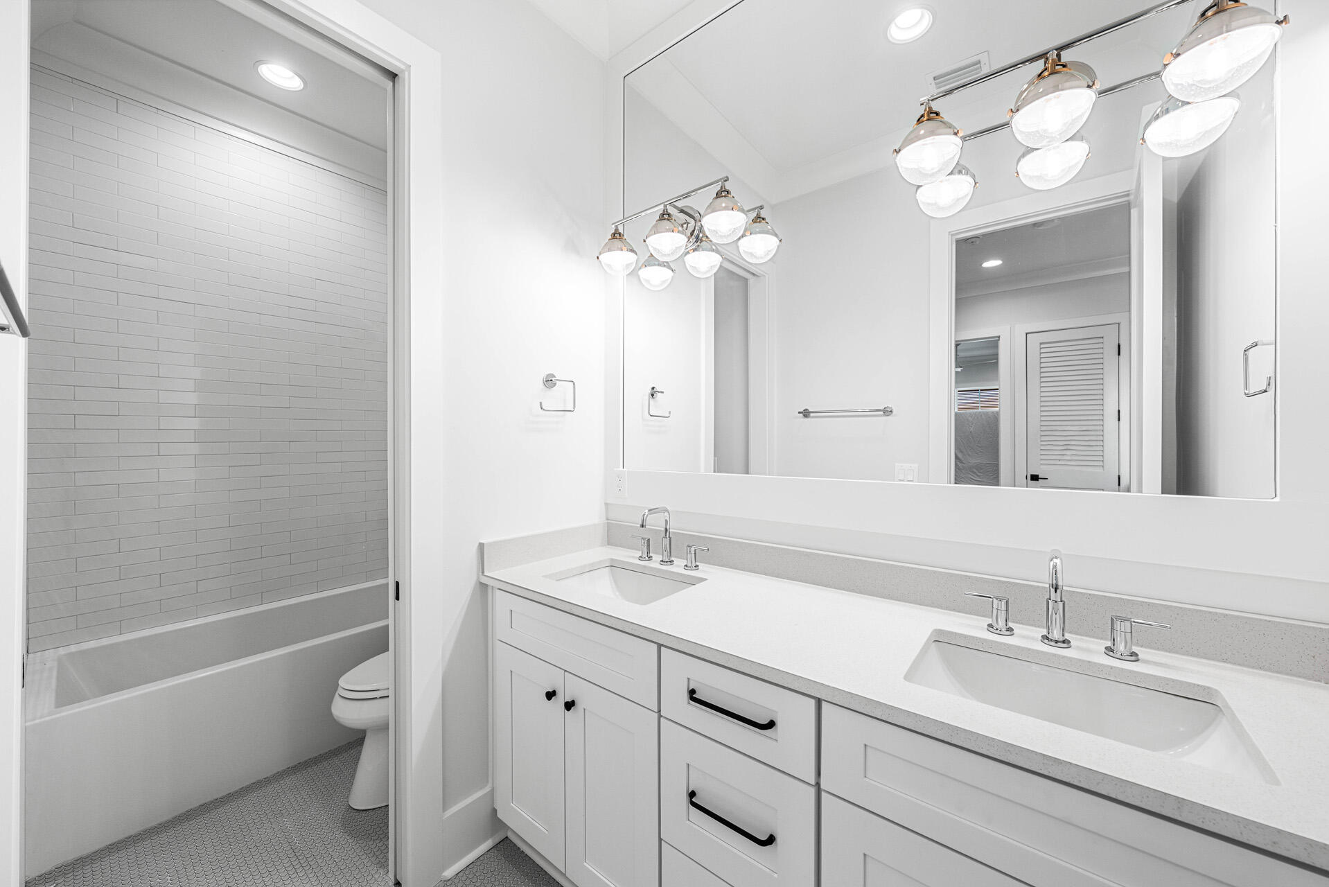 520 South County Highway 393, Unit 39B Santa Rosa Beach, FL 32459 - Photo 33 of 45 a bathroom with a granite countertop sink a toilet and a mirror
