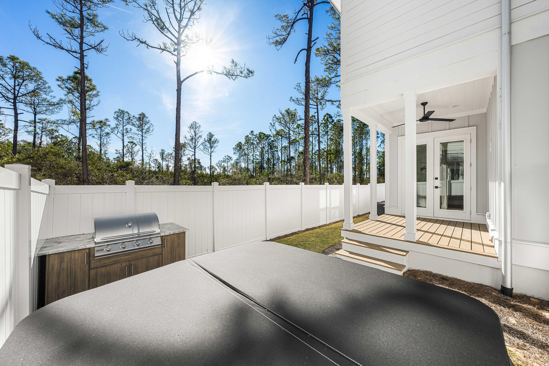 520 South County Highway 393, Unit 39B Santa Rosa Beach, FL 32459 - Photo 37 of 45 a view of a house with backyard and porch
