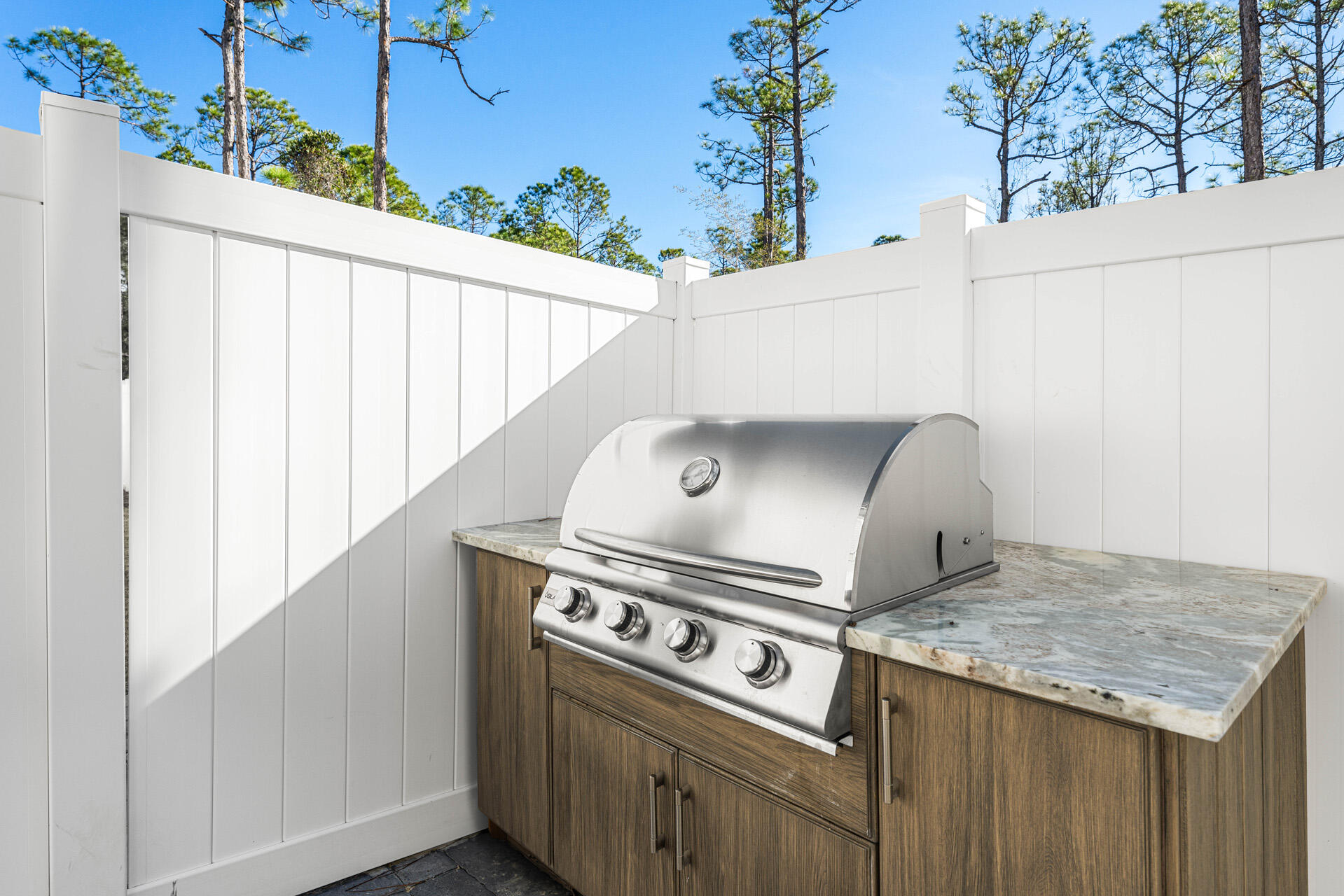 520 South County Highway 393, Unit 39B Santa Rosa Beach, FL 32459 - Photo 38 of 45 a close view of a stove top oven and sitting space