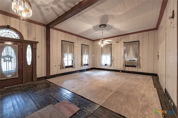 an empty room with windows