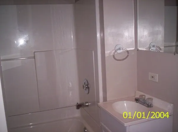 a bathroom with a sink and a bathtub