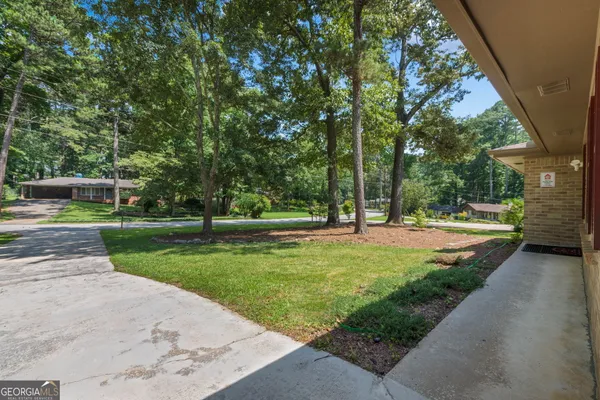 a view of a park with tree s