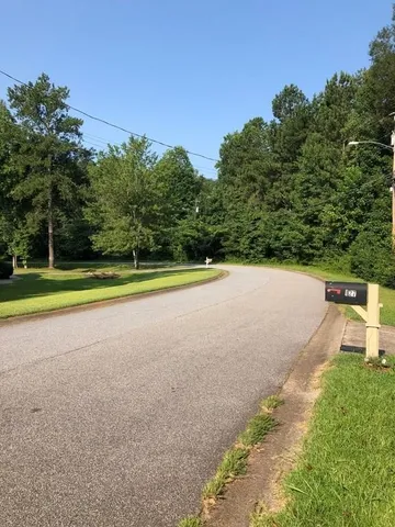 a view of a yard with an outdoor space