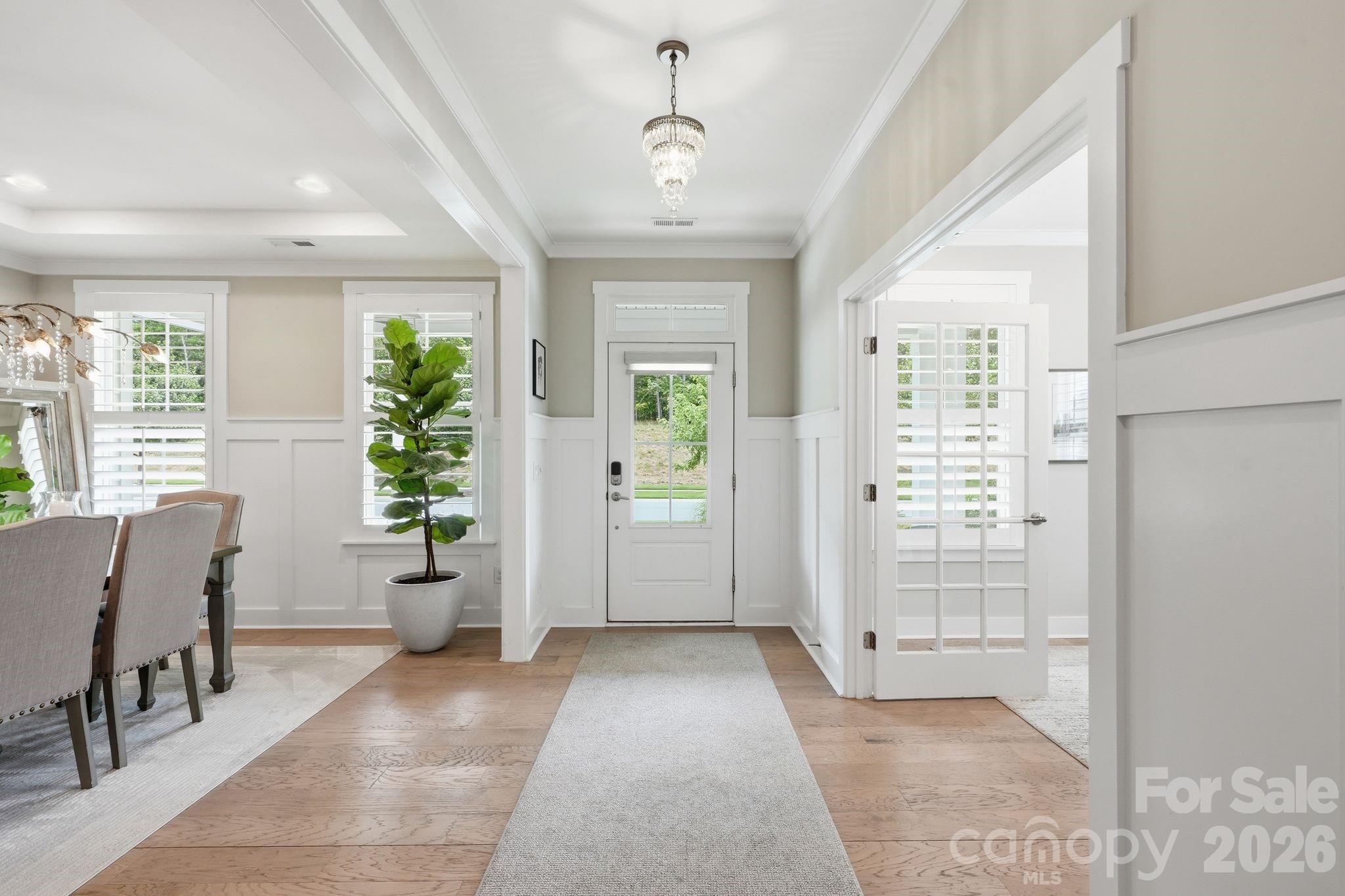 1086 Weir Court Fort Mill, SC 29708 - Photo 6 of 40 a living room with furniture and windows