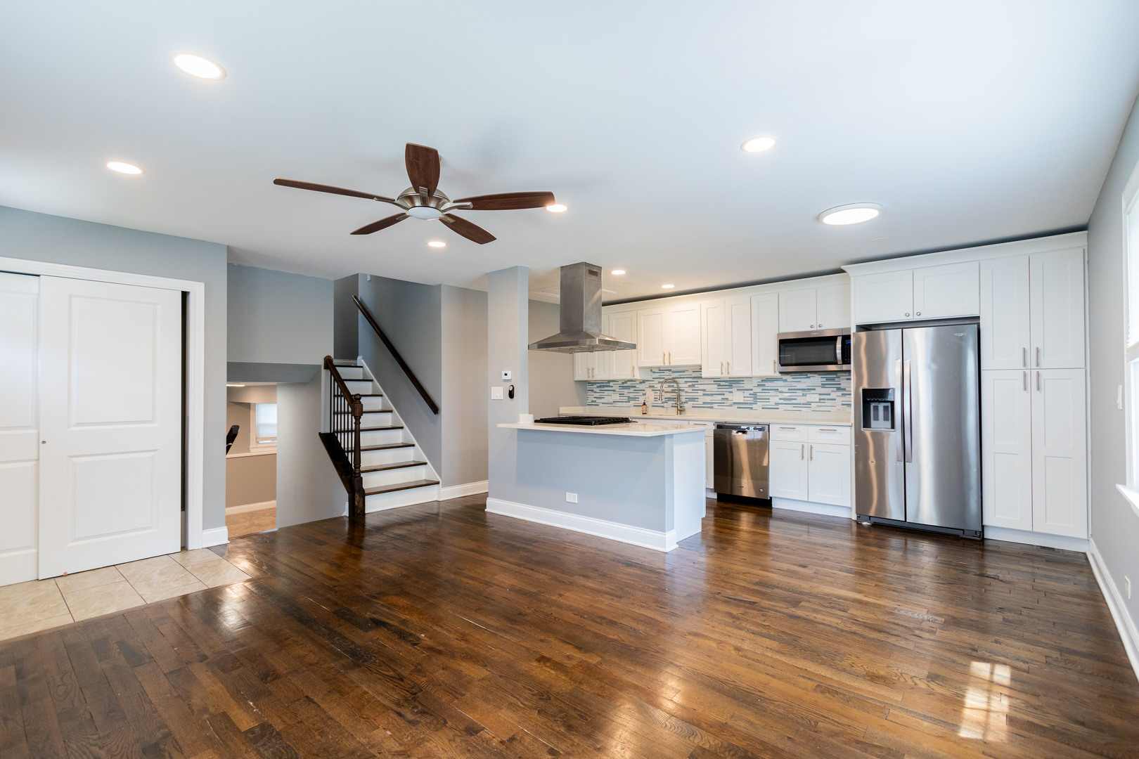 1582 Timber Trail Wheaton, IL 60189 - Photo 4 of 24 a kitchen with stainless steel appliances a refrigerator and a stove top oven
