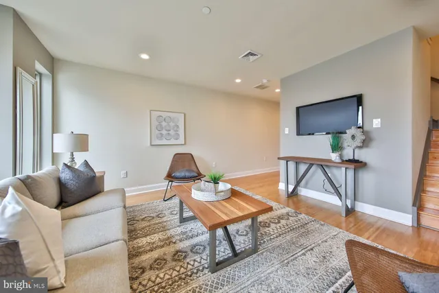 a living room with a couch and a coffee table