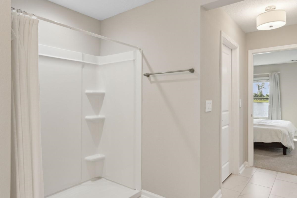 52 Carlota Way St. Augustine, FL 32095 - Photo 14 of 19 a bathroom with a toilet and a shower