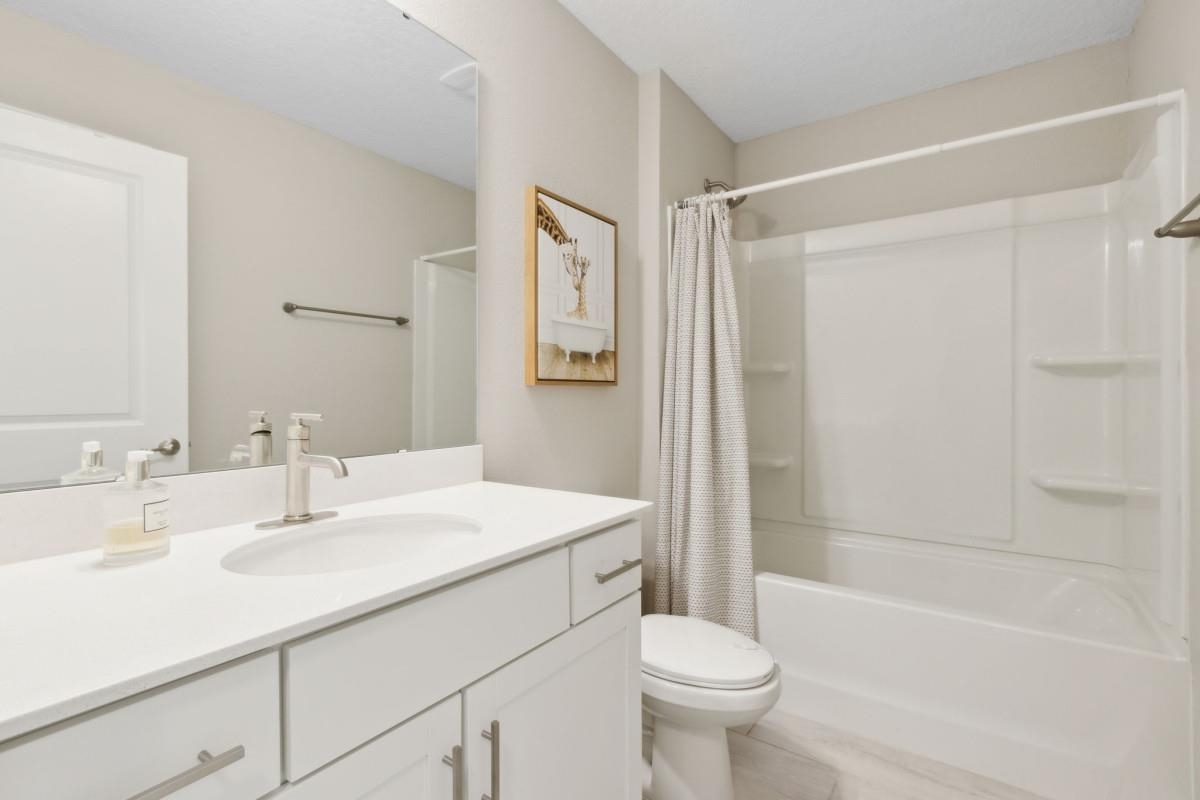 52 Carlota Way St. Augustine, FL 32095 - Photo 15 of 19 a bathroom with a sink toilet and shower