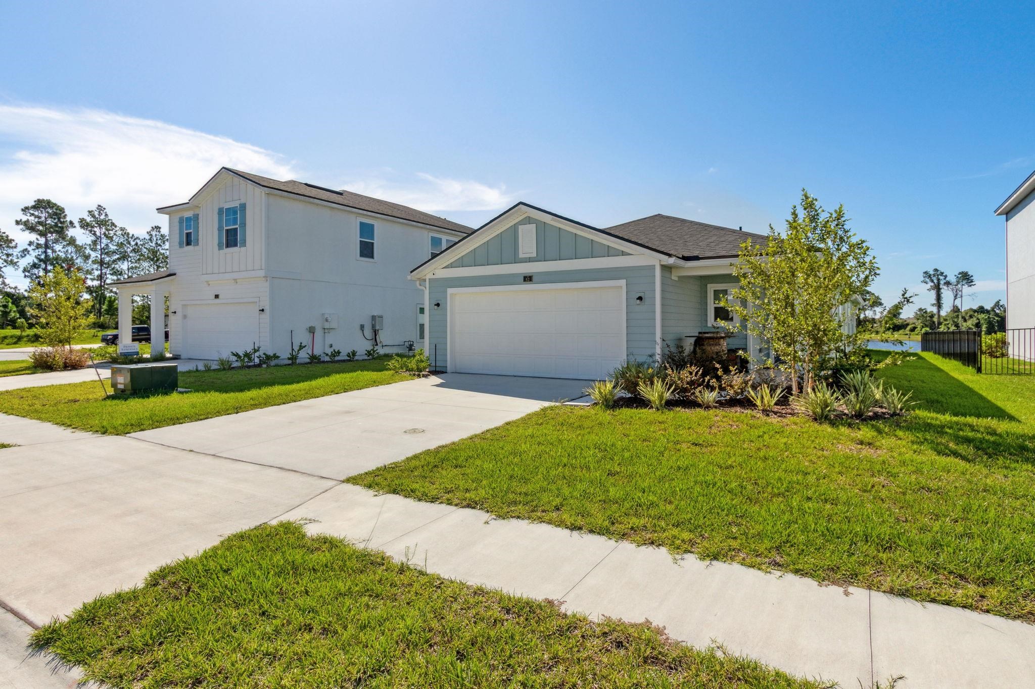 52 Carlota Way St. Augustine, FL 32095 - Photo 17 of 19 a house view with a garden space
