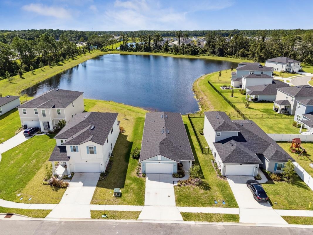 52 Carlota Way St. Augustine, FL 32095 - Photo 18 of 19 an aerial view of a house with a swimming pool and outdoor seating