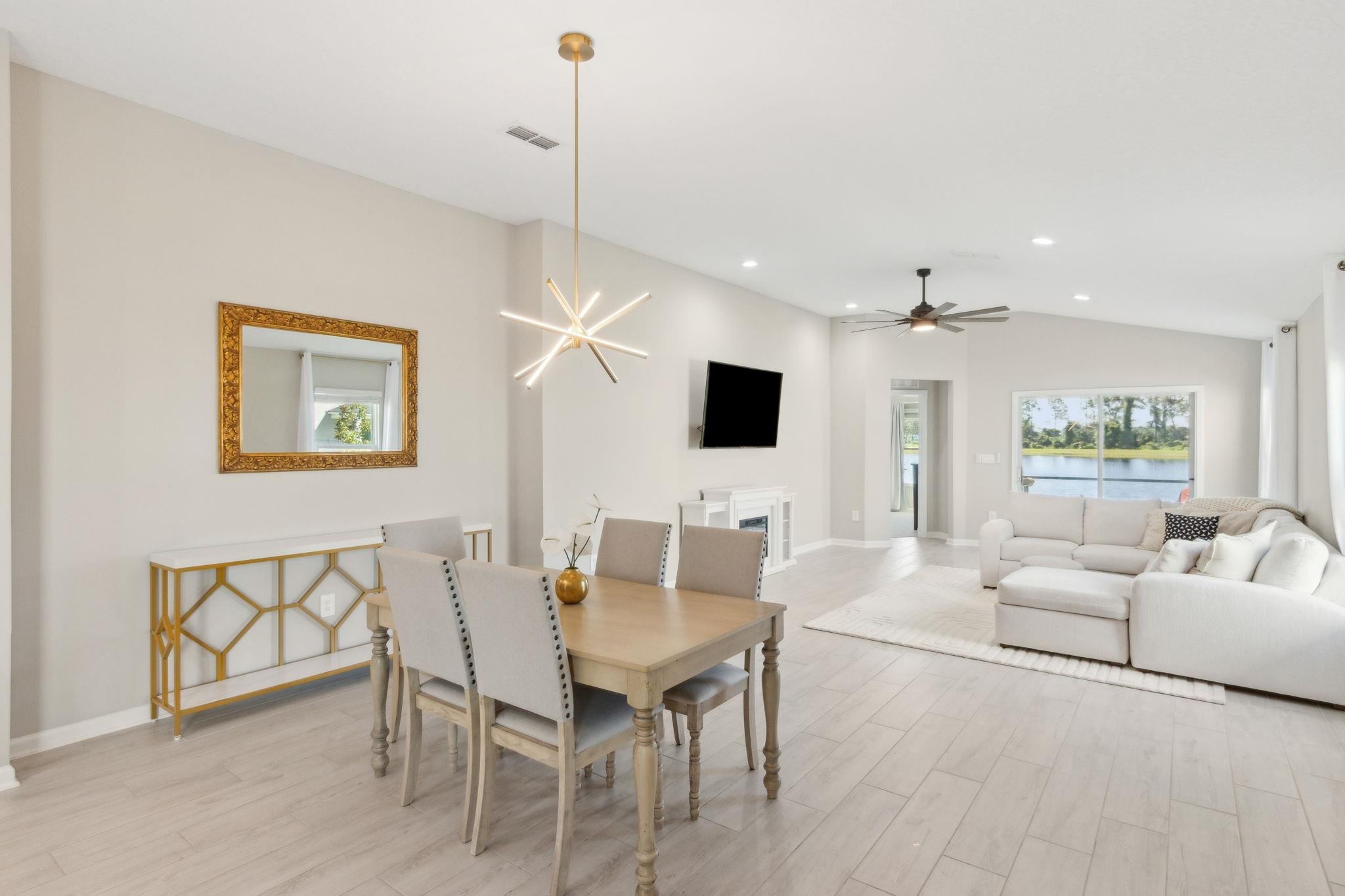 52 Carlota Way St. Augustine, FL 32095 - Photo 5 of 19 a living room with furniture and a flat screen tv
