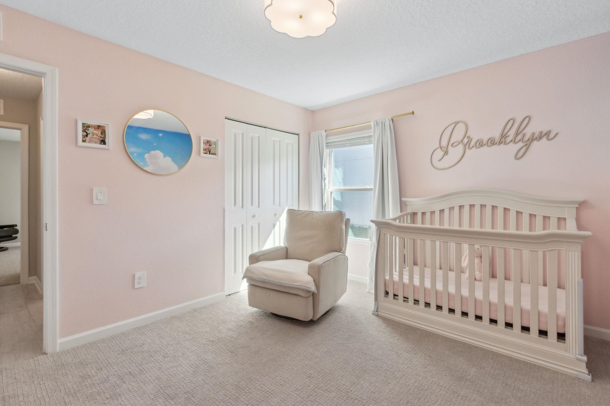 52 Carlota Way St. Augustine, FL 32095 - Photo 9 of 19 a bedroom with furniture and a window