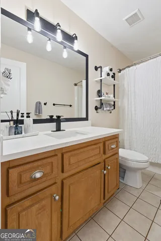 a bed room with a bed and a window