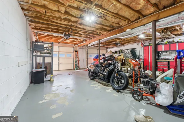 a view of a room with wooden walls
