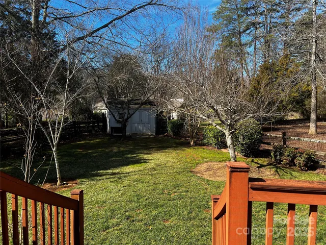 a backyard of a house with lots of green space