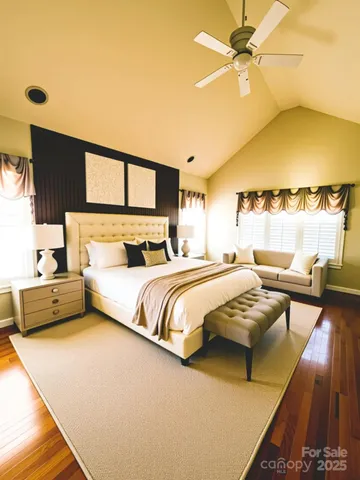 a bedroom with a bed and a night stand