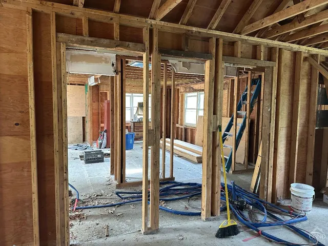 a view of an entryway with a door