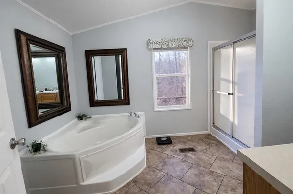a bathroom with a sink and a bathtub