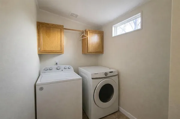 a view of kitchen and utility room