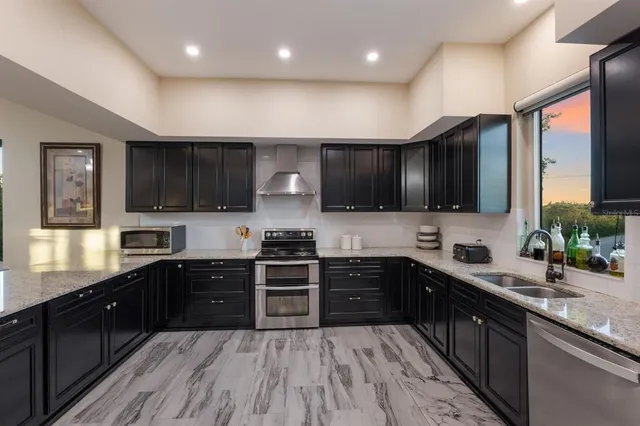 a bed room with a bed and a television