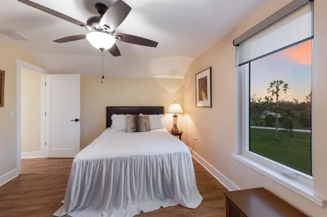 en empty room with furniture and flat screen tv