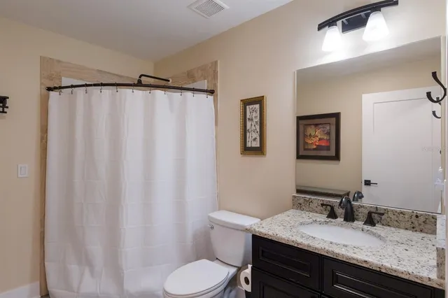 a view of grassy field with trees