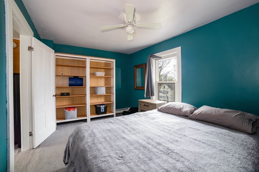 4 Brown Street Spencer, MA 01562 - Photo 18 of 34 a bedroom with a bed closet and a window
