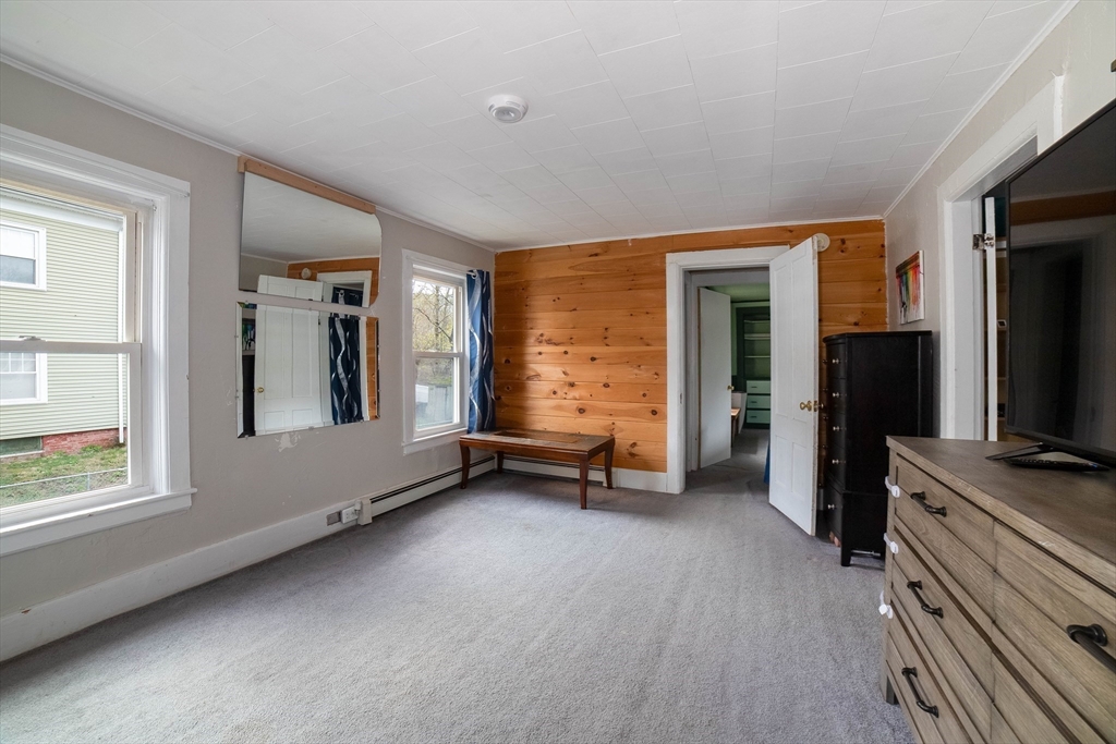 4 Brown Street Spencer, MA 01562 - Photo 20 of 34 a view of room with window and furniture
