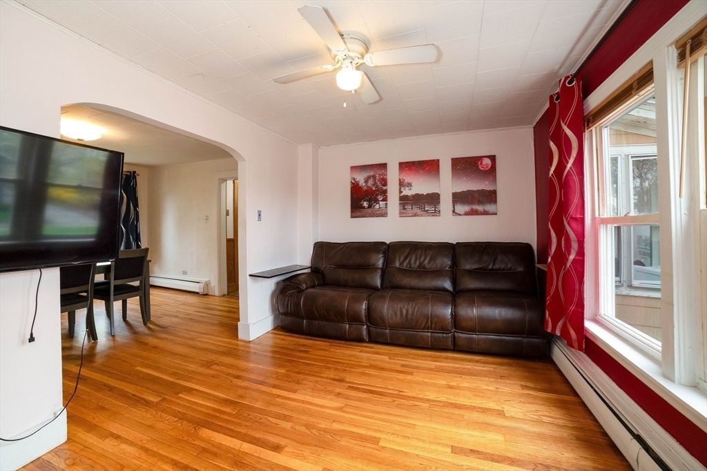 4 Brown Street Spencer, MA 01562 - Photo 2 of 34 a living room with furniture and a flat screen tv