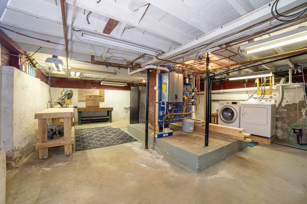 4 Brown Street Spencer, MA 01562 - Photo 25 of 34 a view of a garage with furniture