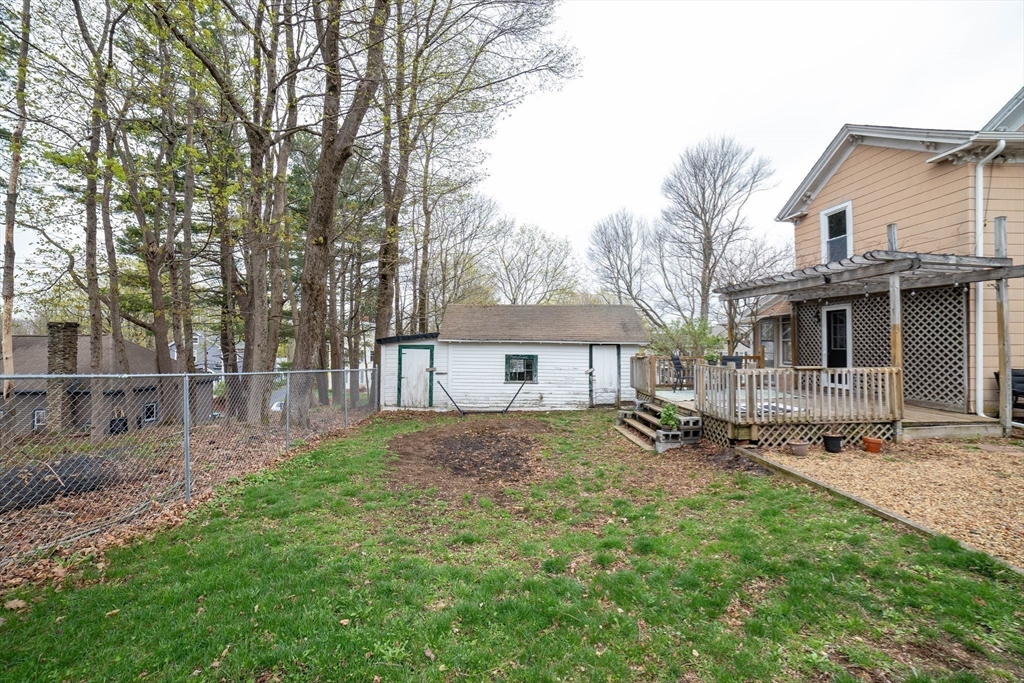 4 Brown Street Spencer, MA 01562 - Photo 30 of 34 a view of a house with a yard and sitting area