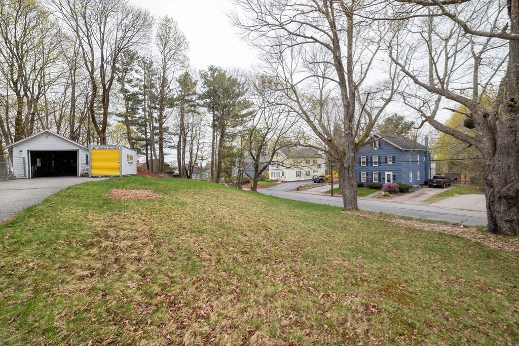 4 Brown Street Spencer, MA 01562 - Photo 32 of 34 a view of a yard with a tree