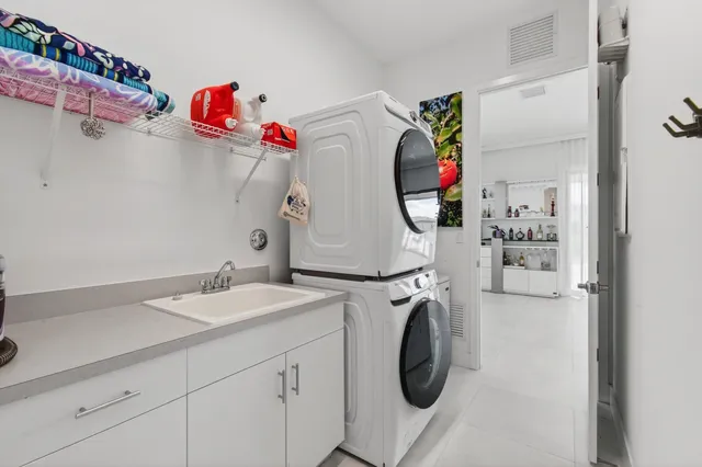 a spacious bathroom with a bathtub sink and mirror