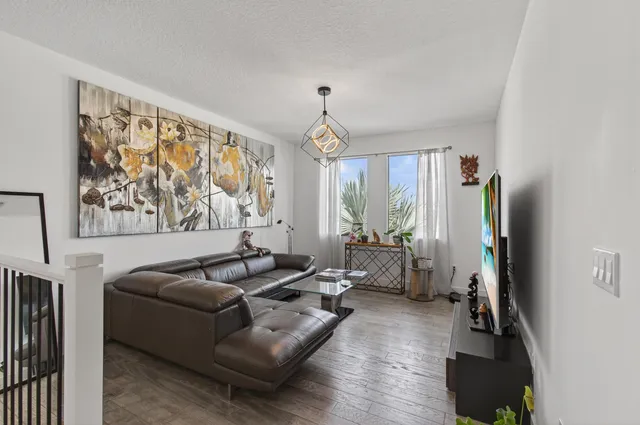 a bedroom with bed and a window