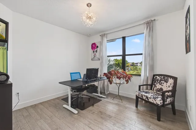 a view of a livingroom with furniture and window