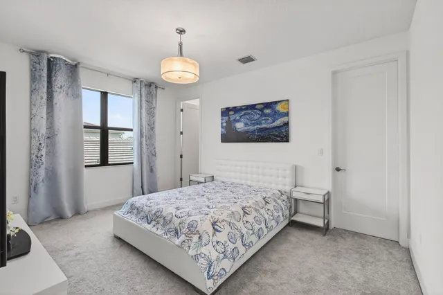 a view of a swimming pool and a chairs