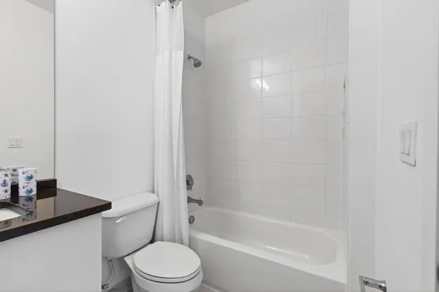 a outdoor space with lots of chairs and a couch