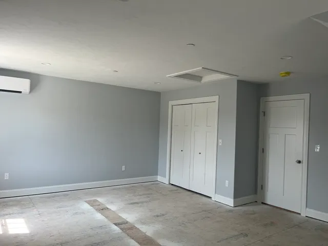 an empty room with windows