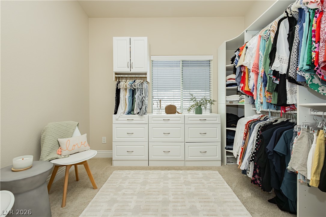 2256 Dogwood Ranch Avenue Henderson, NV 89052 - Photo 33 of 51 Custom cabinetry and ample storage define this organized walk-in closet.