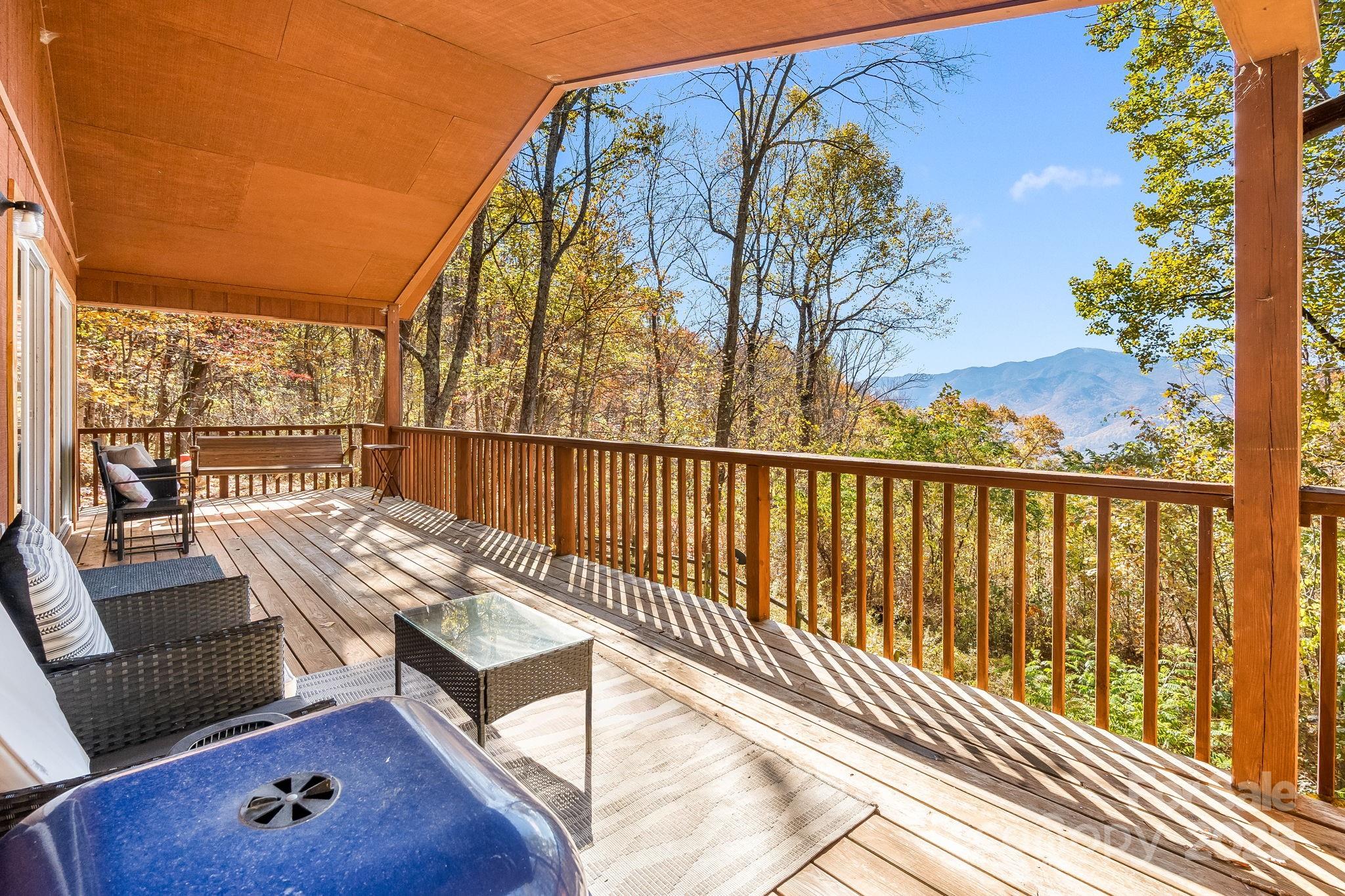 146 Promiseland Road Canton, NC 28716 - Photo 2 of 30 a balcony view with couple of black and white chairs