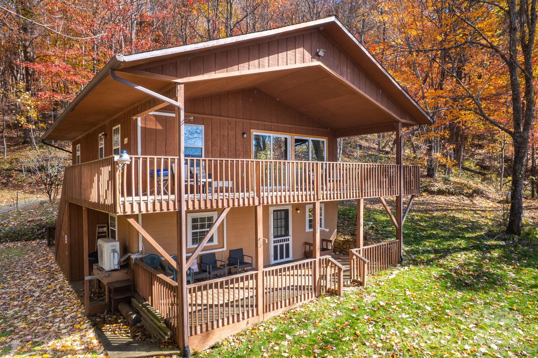 146 Promiseland Road Canton, NC 28716 - Photo 3 of 30 a front view of a house with balcony