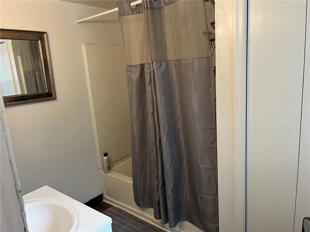 765 3rd Street Whitehall, PA 18052 - Photo 15 of 30 A well-maintained bathroom with a sleek vanity and convenient shower.