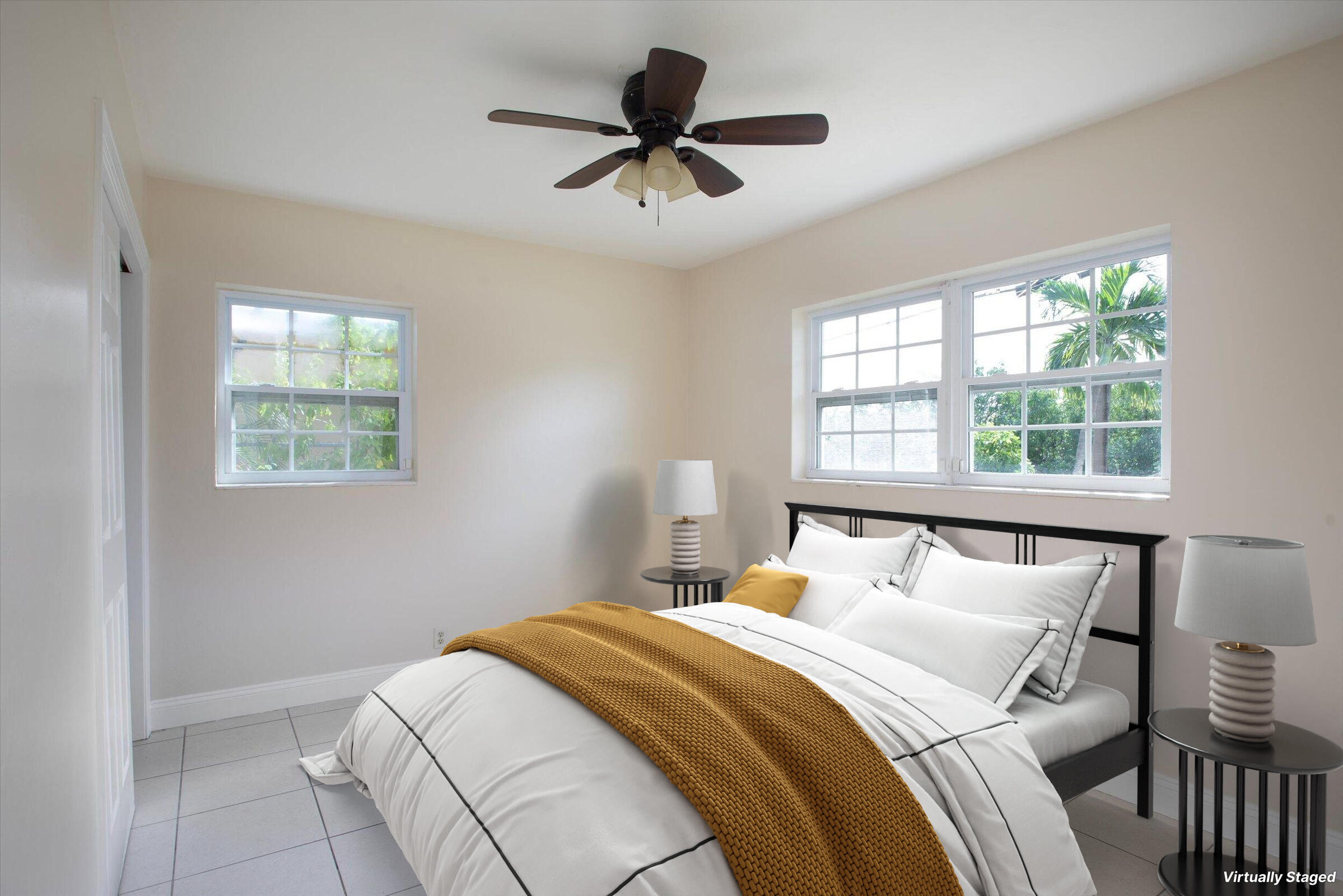 74 Key Haven Road Key West, FL 33040 - Photo 15 of 28 a bedroom with a bed and a window