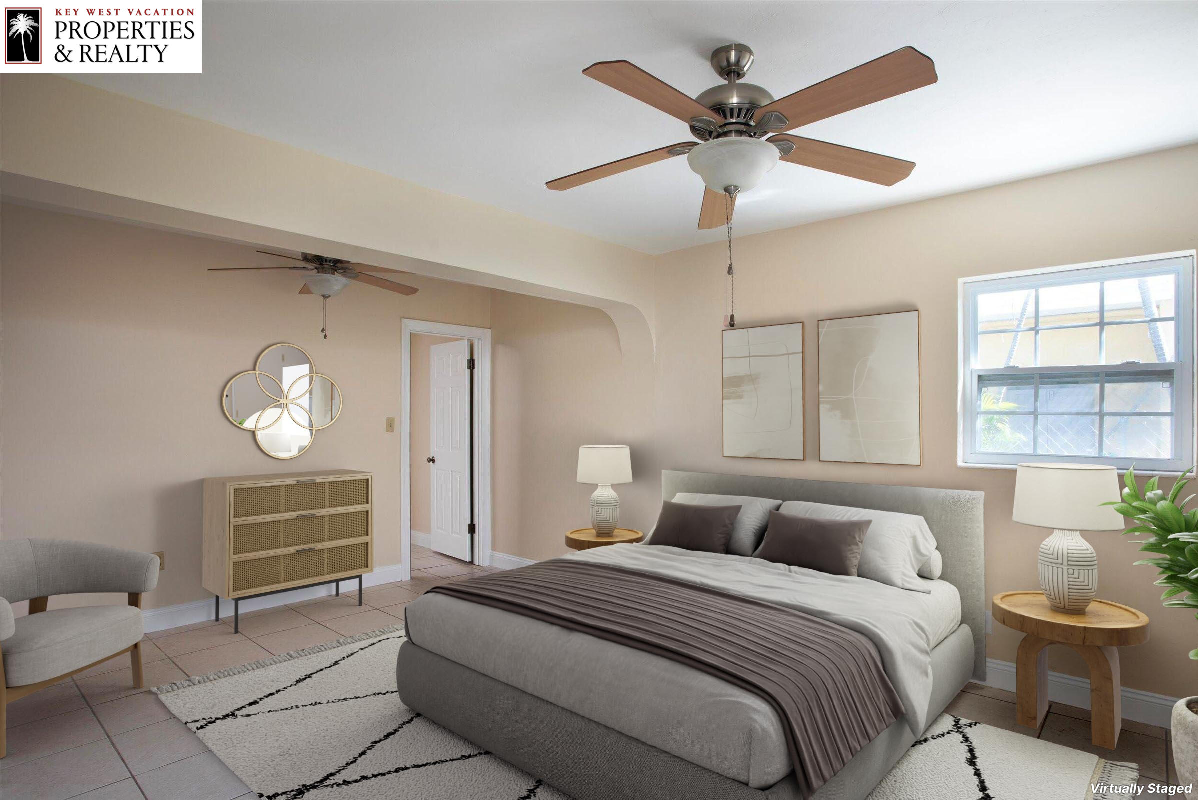 74 Key Haven Road Key West, FL 33040 - Photo 16 of 28 a bedroom with a bed and window