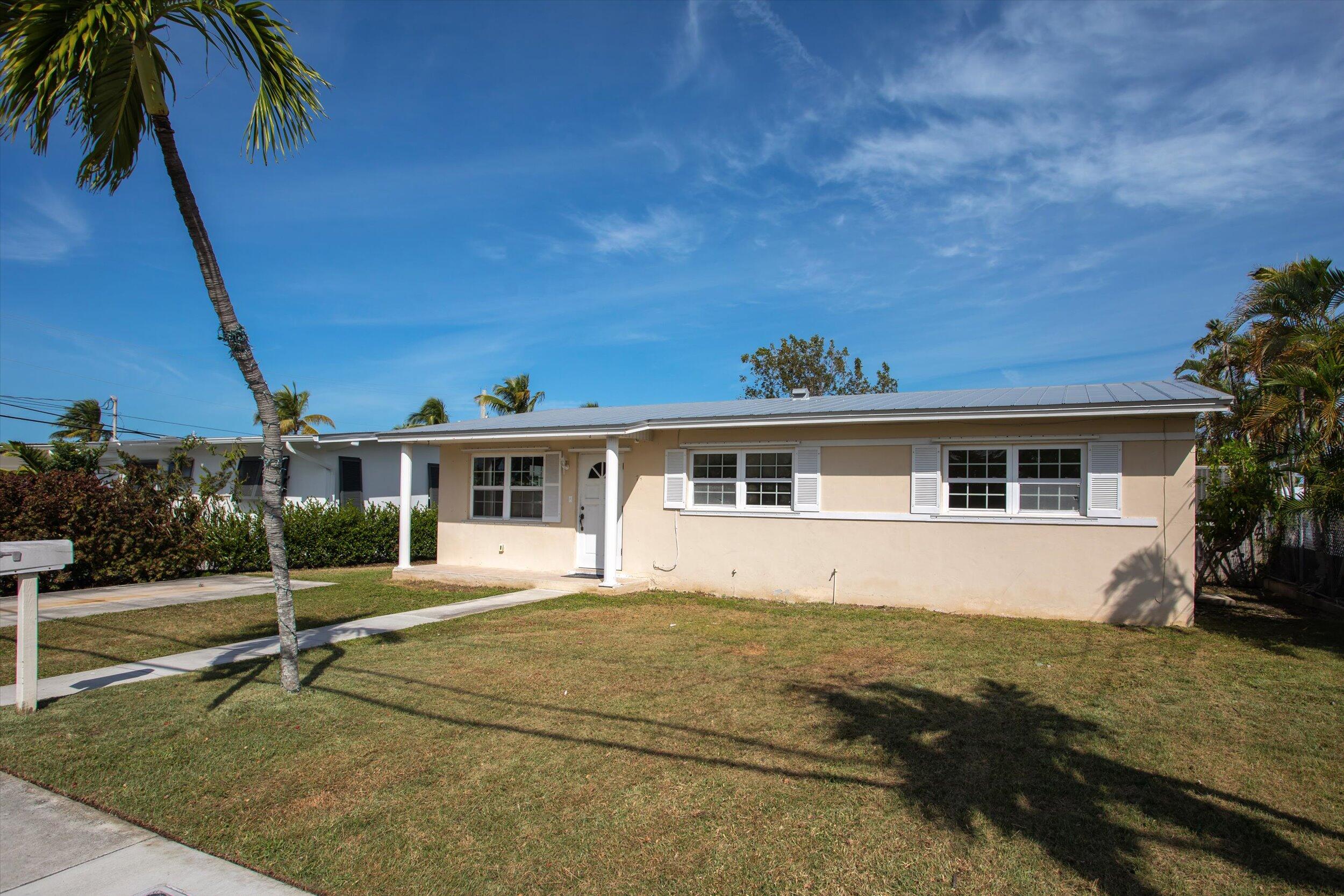 74 Key Haven Road Key West, FL 33040 - Photo 2 of 28 a view of house with a yard
